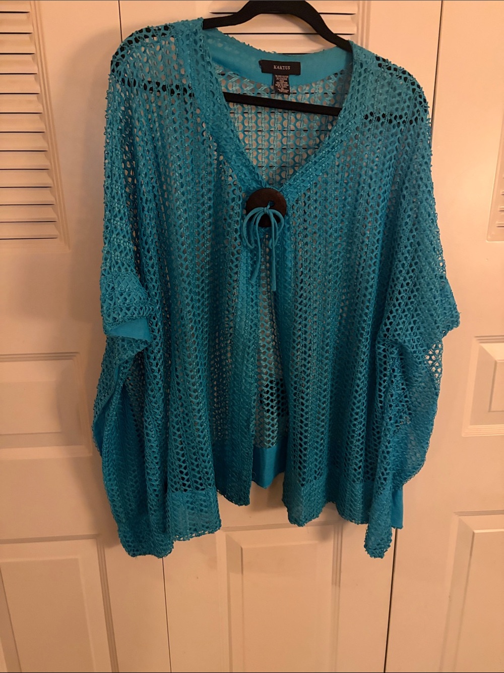 Open-Knit V-Neck Sweater Tunic in Teal, netted